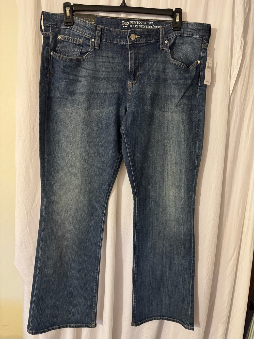 GAP Woman’s Sexy Bootcut Jeans in Washed Blue. Size 18/34